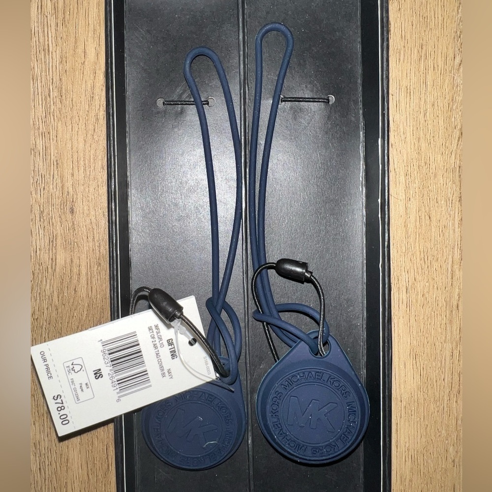 Navy Michael Kors AirTag holders with tags and box